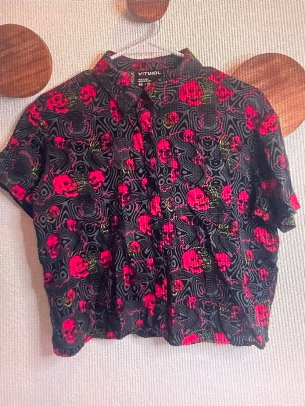 Vibrant Black and Neon Pink Skull Print Button-Down Blouse